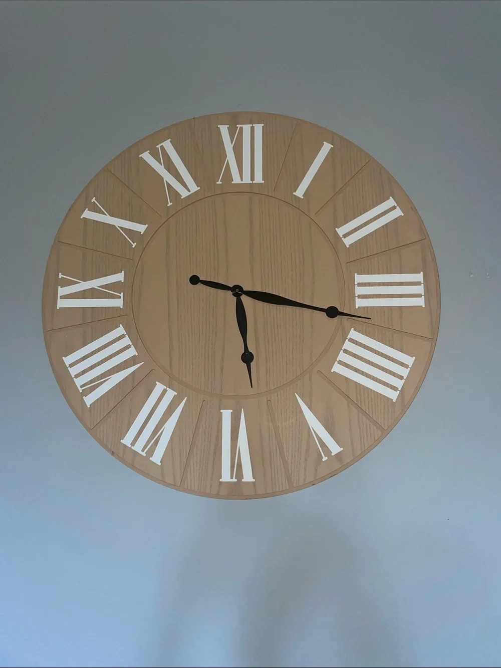 Classic Wood-Tone Wall Clock with White Roman Numerals